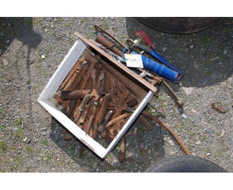 A quantity of old tools, spanners, hand saws, etc.