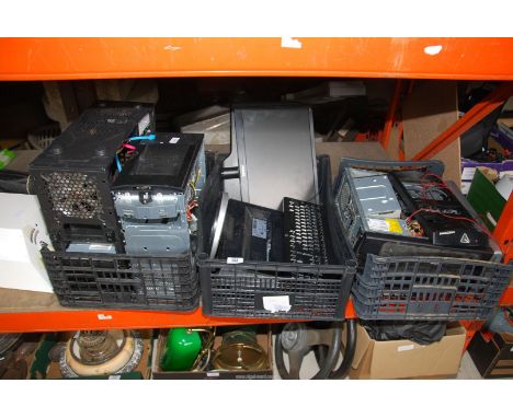 Three Computer towers, two monitors and a keyboard [probably for spares].