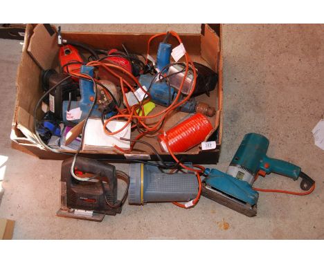 A box of miscellaneous power tools, sanders, drills, etc.