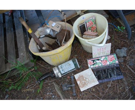 Two buckets of decorative ties, fire extinguisher, tools, etc.