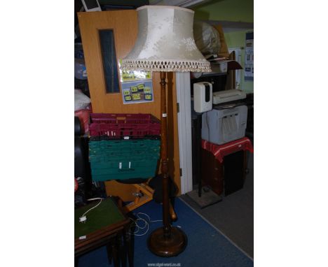 A standard lamp with shade.