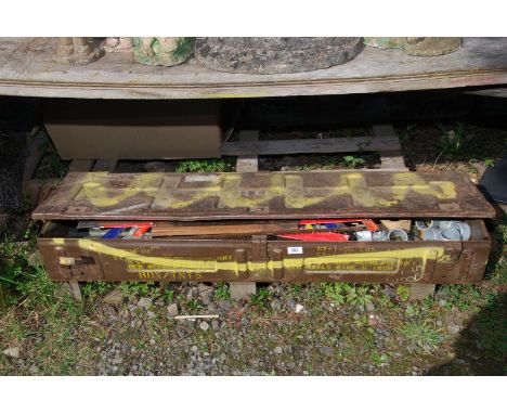 An Ammunition box and contents, hand saws, galvanised pipe, threaded bar, etc.