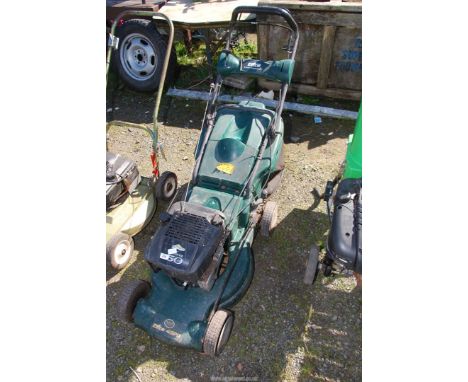 A "McCulloch" petrol lawn mower, self propelled [engine turns and has good compression].