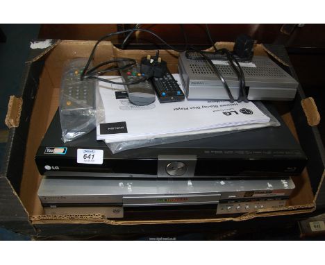 An LG Blu-ray Player with instructions and remote, a Panasonic DMR-E50 DVD Video Recorder with instructions and a Humax F2-10