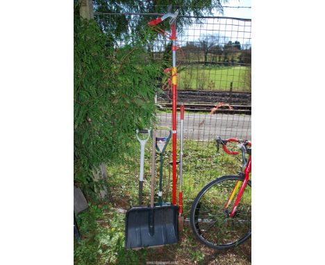 A small quantity of garden tools, long handled bulb planter, pruner, etc.