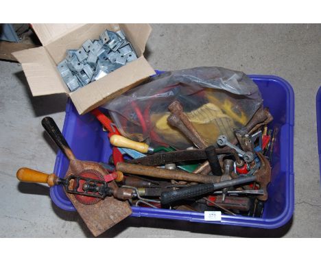A box of old hand tools, jump leads, etc.