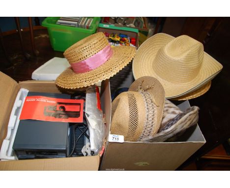 A box of hats and a Rank Aldis projector.