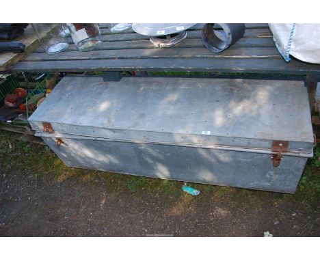 A large galvanised trunk and contents.