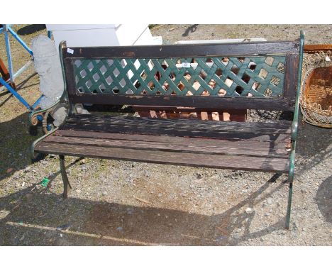 A garden bench with Wrought Iron ends and back, 4 ft long x 17'' deep x 28'' high.
