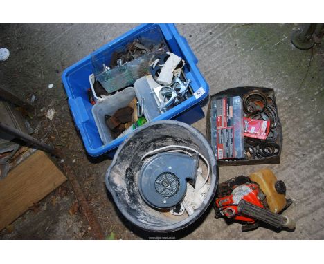 A box of miscellaneous, hose clips, strimmer engine, etc.
