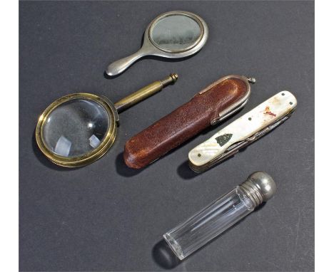 Mother of pearl handled utility knife, together with a brass framed looking glass, a small mirror and a scent bottle (qty) 