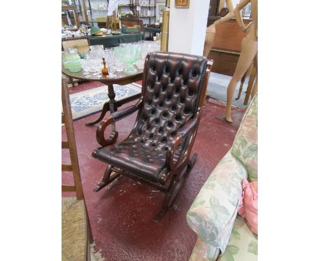 Leather & mahogany button-back rocking chair