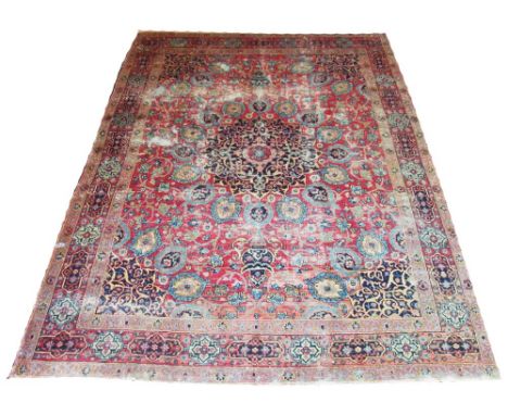 ANTIQUE TABRIZ CARPET, 320cm x 244cm, circa 1880, central medallion with palmettes and vines on a rouge field within geometri