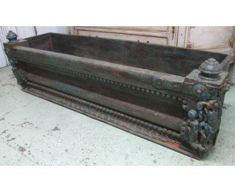 RAJASTHAN BALCONY PLANTER, teak with traces of paint carved with figures, 181cm x 57cm H x 51cm. (with faults)