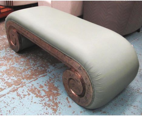 WINDOW STOOL, of curved form in soft green leather with distressed silver gilt scrolled base, approximately 49cm H x 52cm D x