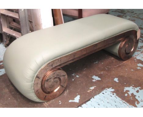 WINDOW STOOL, of curved form in soft green leather with distressed silver gilt scrolled base, approximately 49cm H x 52cm D x