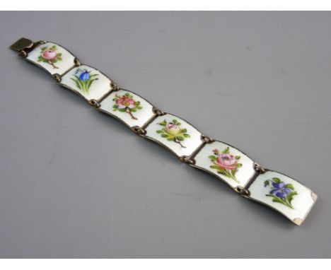 A SILVER AND ENAMEL BANGLE of six oblong floral enamel tablets