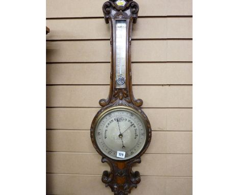 A LATE 19th CENTURY WELL CARVED OAK BANJO BAROMETER with thermometer, 84 x 34 cms