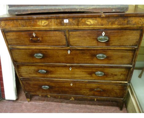 A GEORGE IV MAHOGANY CHEST of two short over three long drawers with Sheraton style inlay, oval brass backplates and pommels 