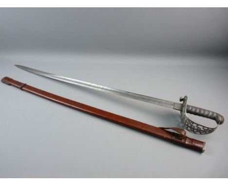 A GOOD VICTORIAN OFFICER'S CEREMONIAL SWORD having a scrolled and pierced steel basket with ray skin and twist wirework handl