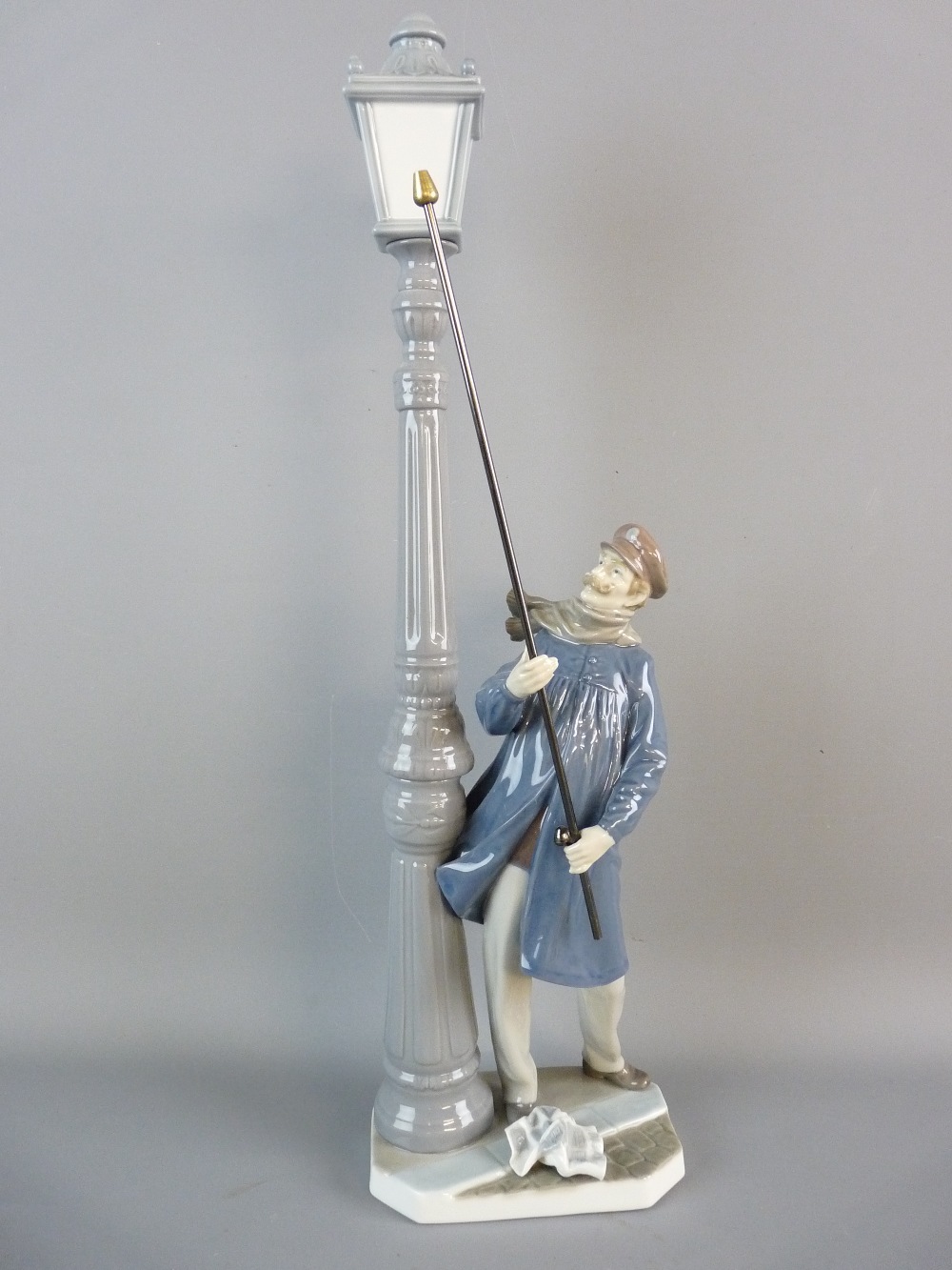 A LLADRO FIGURE 'Lamp Lighter', no. 5205 to the base, 47 cms high