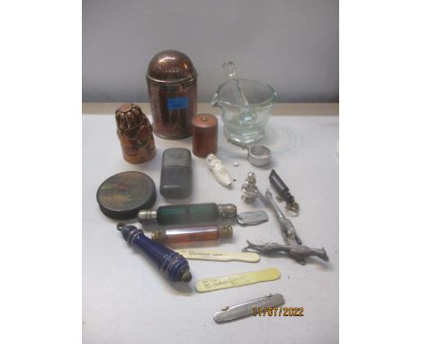 A mixed lot of items to include a copper flour dredger, three small jelly moulds, porcelain whistle in the form of a baby in 