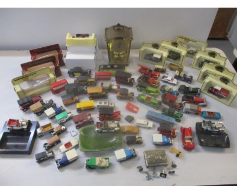 Silver cufflinks, a decorative box, a brass anniversary clock and diecast models to include Yesteryear, Matchbox and othersLo