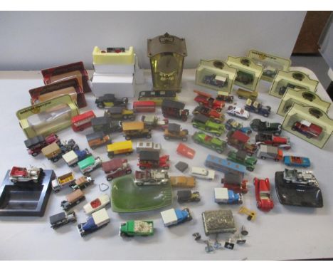 Silver cufflinks, a decorative box, a brass anniversary clock and diecast models to include Yesteryear, Matchbox and othersLo