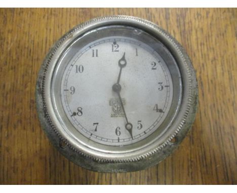 A 1920/30's Smiths car dashboard clock in working order, 11cm diaLocation: 