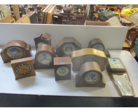 A group of nine Victorian, Art Deco and early 20th century walnut, rosewood, oak and mahogany mantel clocks, and an Art Deco 