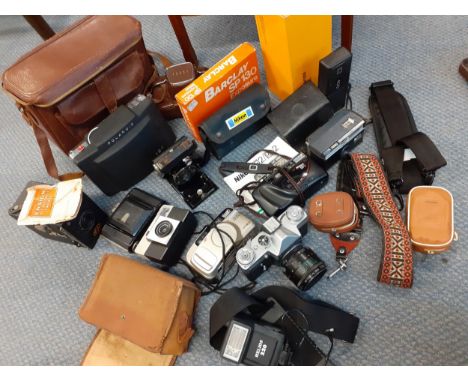 Cameras and photographic equipment to include an Instamatic 50, a Nikon RF2, a Prinzflex 500E, a Minolta Riva Zoom 70, Kodaks