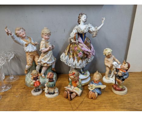 Late 19th century and later German figures to include six Gobel, Schaubach Kunst a boy with a lamp, a large musician and a bo