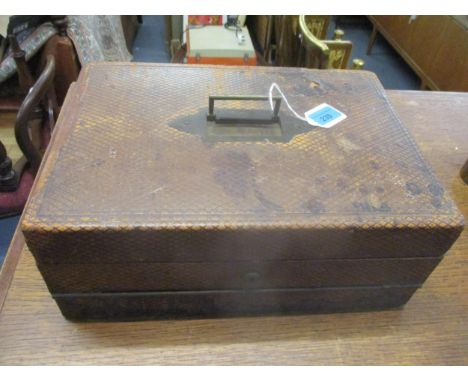 A Victorian leather clad writing box, fitted interior with leather scriber and hinged front revealing a stationary rack, Bram