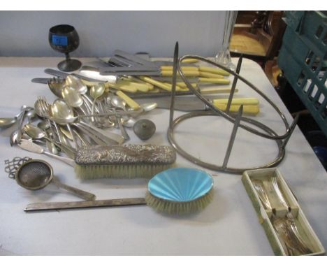 A selection of silver and silver plated items to include a silver and blue guilloche enamelled brush, a dressing table brush 