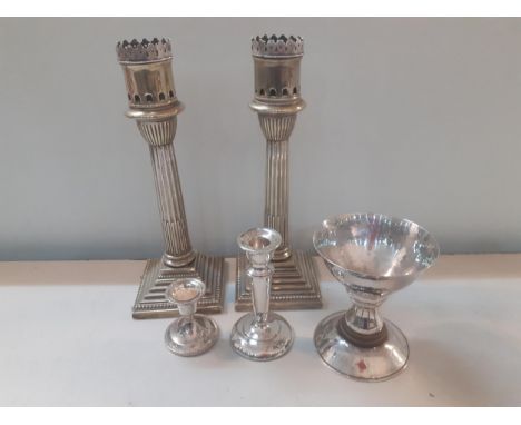 silver and silver plate to include a silver candlestick, a pair of silver plated candlesticks, a chalice and dwarf candlestic