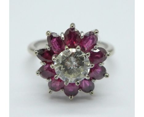 An 18ct gold, platinum set (tested), ruby and diamond cluster ring, 1ct diamond weight and approximately 1.5ct ruby weight, O