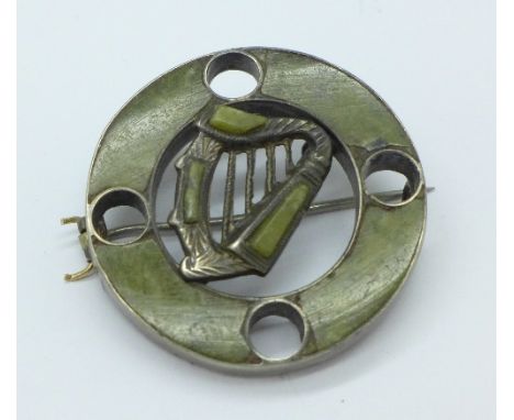 A silver and agate harp brooch