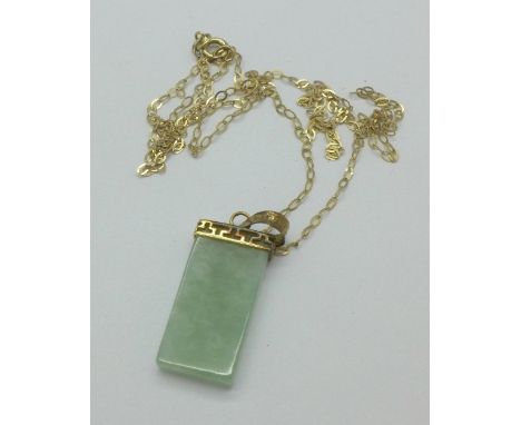 A 9ct gold and jade pendant and chain