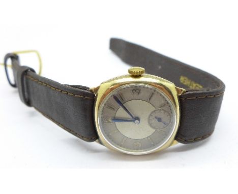 A gentleman's cushion shaped Omega wristwatch in a 9ct gold Dennison case hallmarked Birmingham 1935, movement 8146410, 28mm 