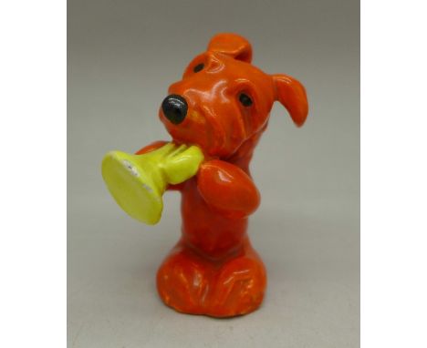 A c.1930's Goldscheider, Wien, figure of a dog with trumpet, small paint chips