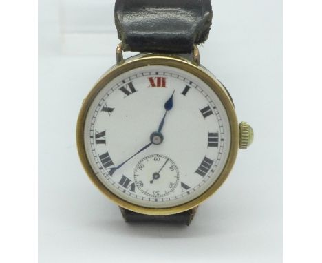 A 9ct gold cased wristwatch with white enamel dial, 29mm case, the case hallmarked London 1924