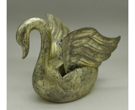 A novelty table lighter in the form of a swan
