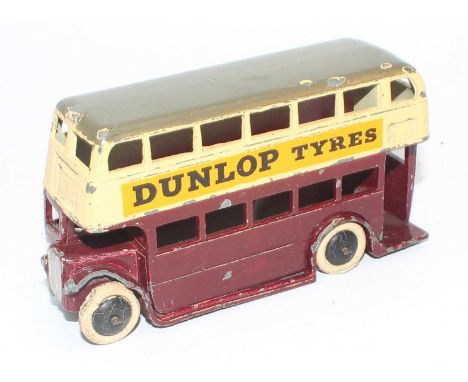 Dinky Toys, 29C Dunlop Double Decker Bus, cream upper body, maroon lower body with grey roof, black smooth hubs and white tyr