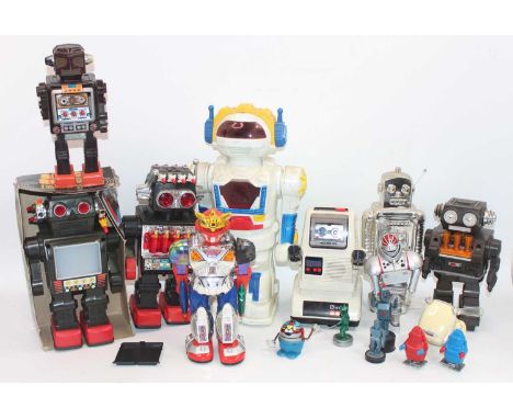 Two trays containing a quantity of various mixed issue vintage and modern release robots, mixed examples include some battery