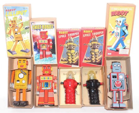 A group lot of 5 tin plate space robotic themed modern robots as follows, Robot Space Trooper x2, one in red and the other in