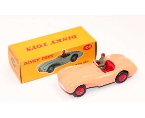 Dinky Toys 104 Aston Martin DB3S in salmon pink with red seats and wheels, with black tyres, with driver, mint correct colour