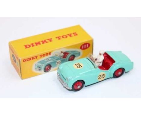 A Dinky Toys, No.111 Triumph TR2 Sports, mint model in aqua green/blue body, red hubs, red interior and driver, in a crisp co