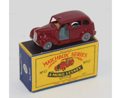 Matchbox Lesney 17c Austin Taxi, maroon body, silver trim, grey plastic wheels, and dark grey interior, in near mint-mint ori