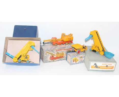 Four various boxed Dinky Toy commercial vehicles to include 2x No. 564 elevator, No. 962 Muir-Hill dumper truck, and No. 972 