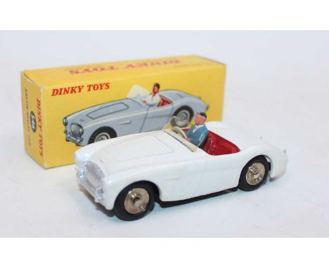 French Dinky 546 Austin Healey 100 sports car, matt white body, red interior with driver and wind-shield, 3 spoke steering wh